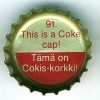 fi-00147 - 91. This is a Coke cap! Tämä on Cokis-korkki